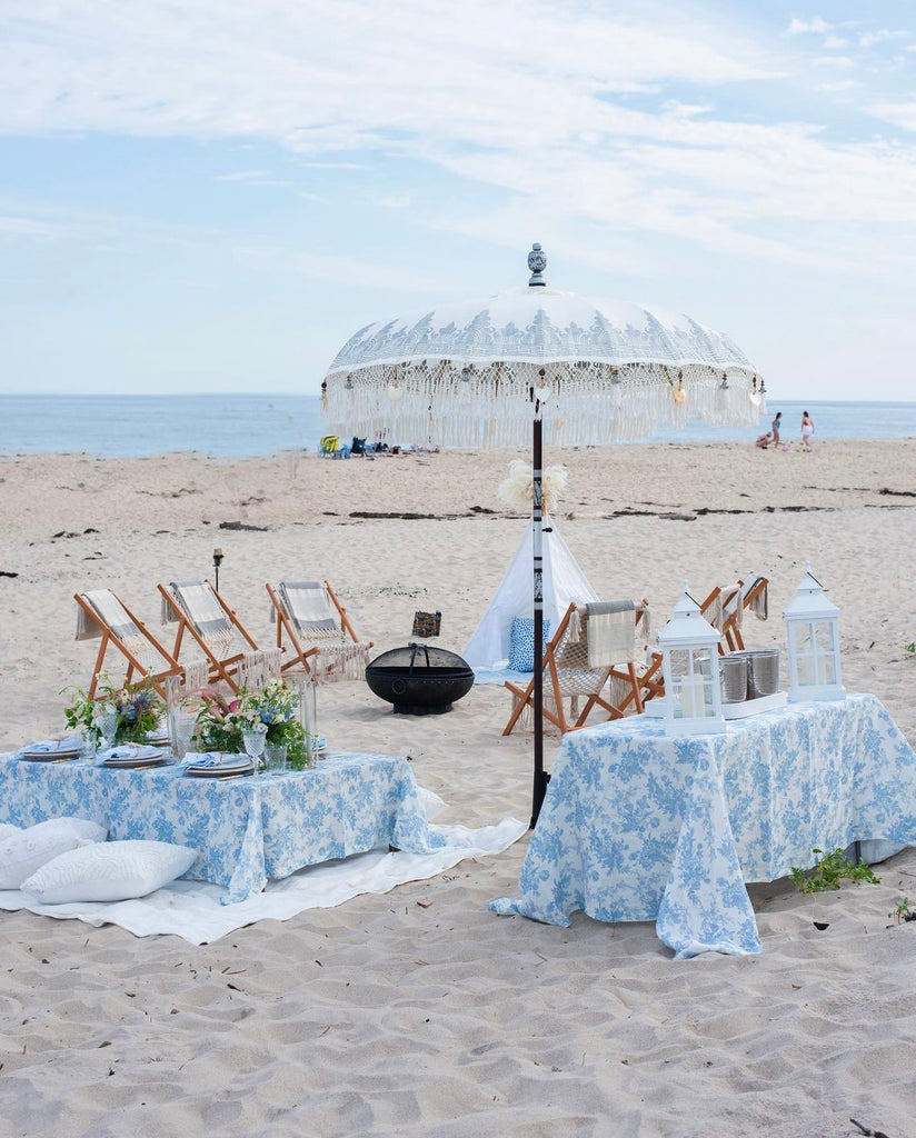 Elegant beach setup with Balinese parasol in the Hamptons, New York